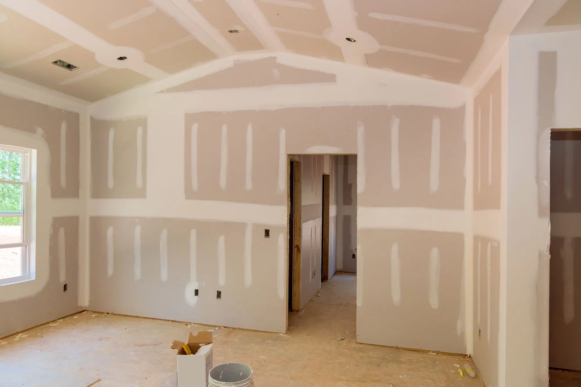 Drywall Vs T-Bar Ceilings: Which Fits Your Build Type?